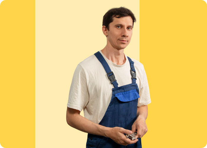 Plumber working on sink